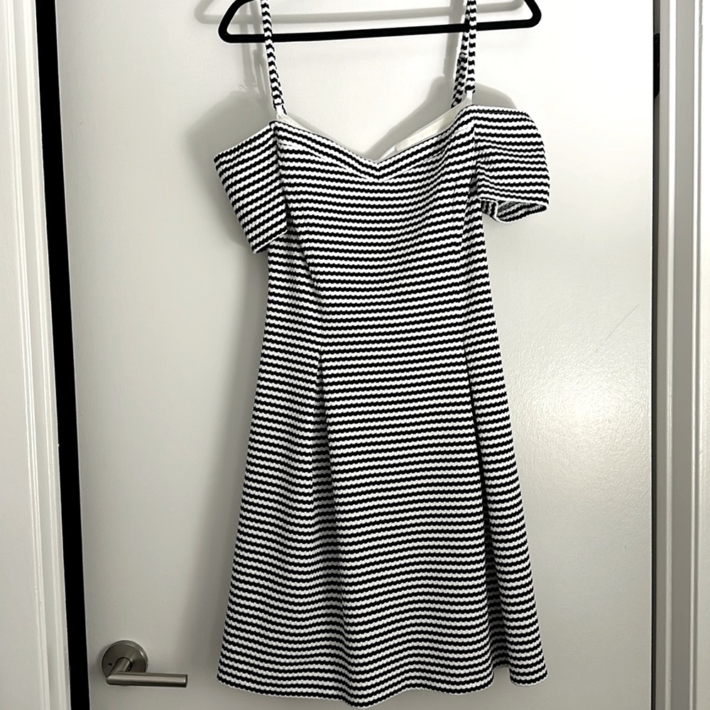 Guess off the solder dress with removable dress, brand new!